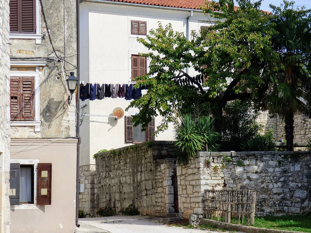 A lived-in stone street in Sveti Lovreč