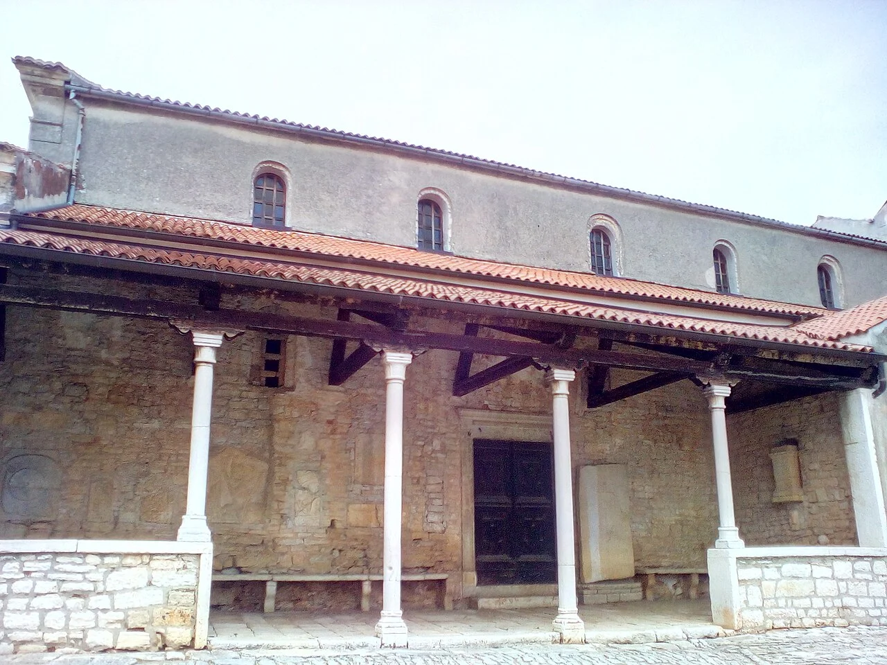 The Basilica of St Martin and town loggia in Sveti Lovreč